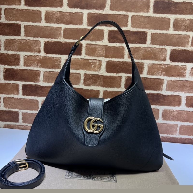 G*u*i top handle bags